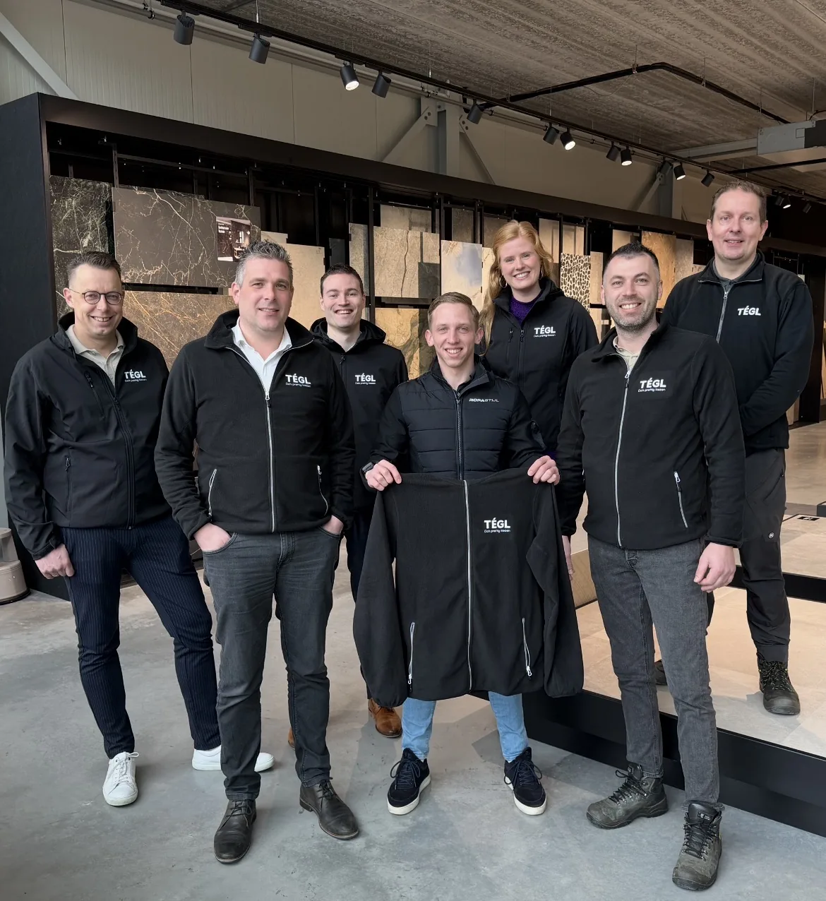 Team in gepersonaliseerde bedrijfskleding voor een lokale zaak in Lunteren